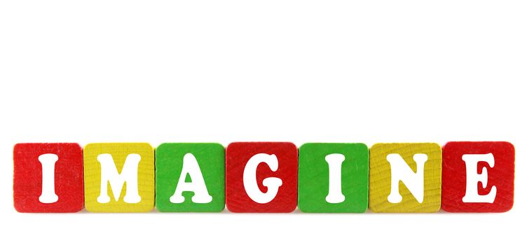 imagine - isolated text in wooden building blocks