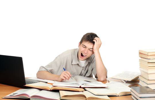 Tired Student Yawning on the School Desk. Isolated on the White