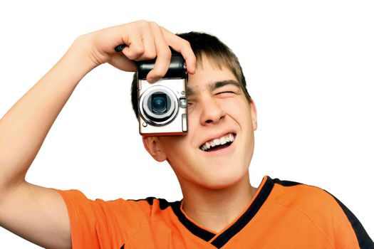 Teenager with small Photocamera gets ready to take a photograph