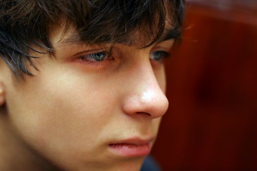 Sad and Pensive Teenager Portrait Closeup