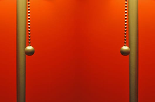 Red Background with two metal rods