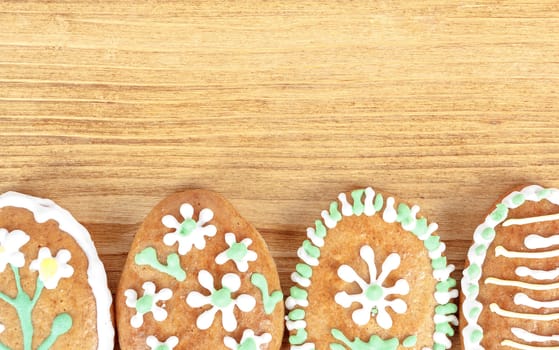 Easter gingerbreads collection on wooden background