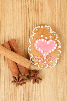 easter gingerbread, cinamon and star anise on wooden background