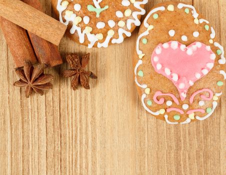 easter gingerbread, cinamon and star anise on wooden background