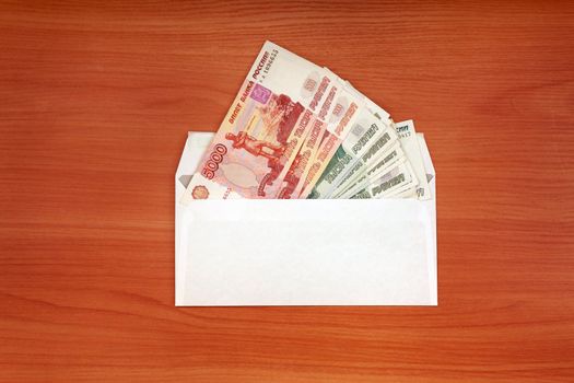 Envelope With Russian currency lying on the table
