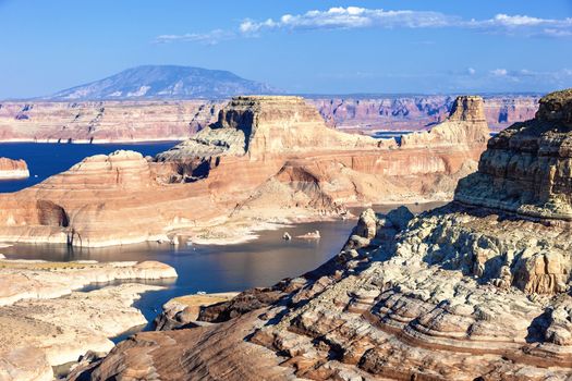 cliffs in the smooth water of the lake Powell