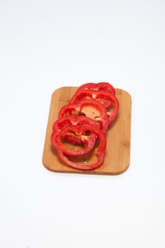 Sliced red pepper isolated on white background