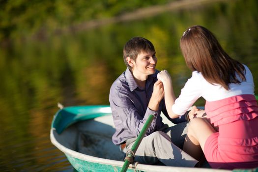 couple in a boat outdoors