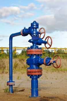 Oil, gas industry. Wellhead with valve armature.