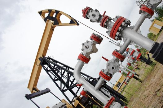 Extraction of oil. pumpjack and oilwell. Western Siberia. Russia.