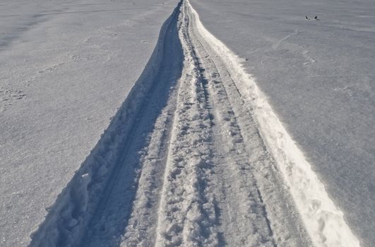 Close up of snowmobile trail