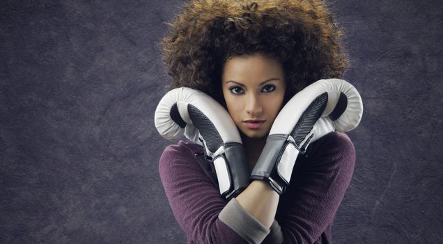 Fashion model with white boxing gloves