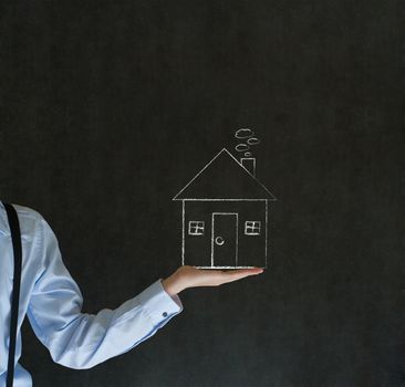 Man teacher, salesman, student or businessman holding chalk house, home or real estate