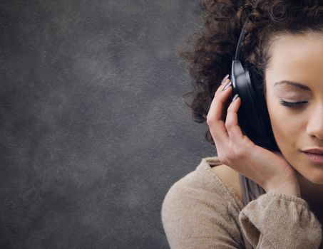 young beautiful woman enjoying music