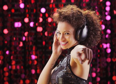 young beautiful woman enjoying music
