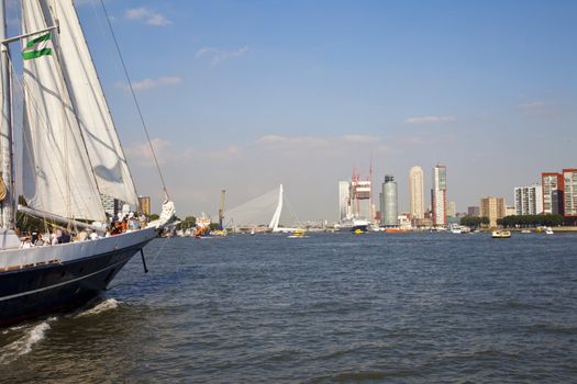 ROTTERDAM, THE NETHERLANDS - 8 SEPTEMBER 2012: View at historical ship and skyline Rotterdam at international harbor day in Rotterdam on September 8 in Rotterdam, The Netherlands 