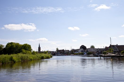 Typical Dutch little village with water