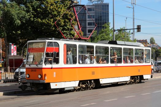 SOFIA, BULGARIA - AUGUST 17: Commuters ride Sofia Tram on August 17, 2012 in Sofia, Bulgaria. Sofia Tramway remains one of longest tram systems in Europe (195km), despite the rise of Sofia Metro.