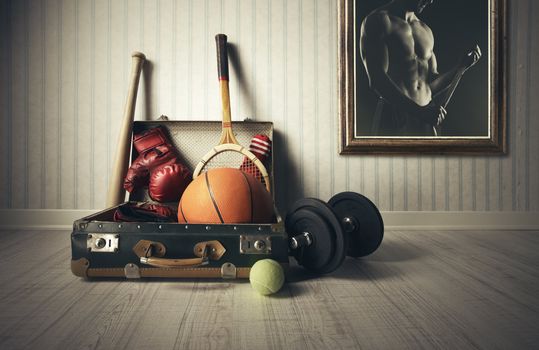 Old Suitcase with sports equipment and athlete photo
