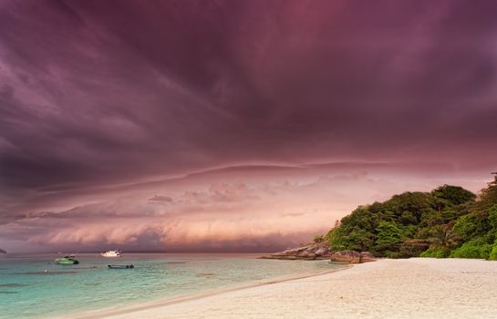 Sandy beach at sunset before a thunder-storm, Thailand