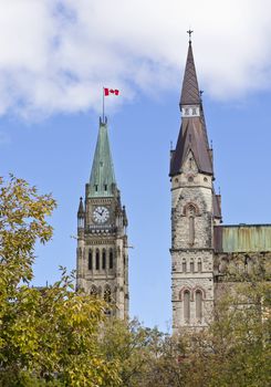 The canadian Parliament Centre Block Peace Tower along with the West Block Tower in Ottawa, Canada.