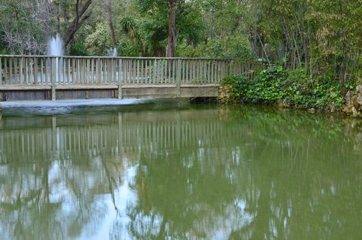 Wooden bridge in Maria Luisa Park, Seville (Spain)