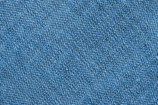 Jeans fabric background texture. Blue textile abstract.