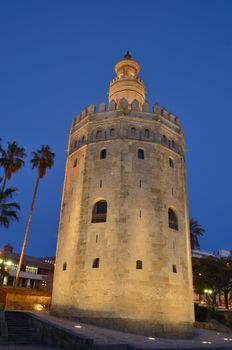 Gold Tower at night in Seville, Spain