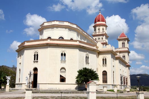 Cuba - famous basilica El Cobre. Religious architecture exterior.