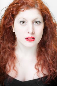 beautiful red hair and lips girl on white background