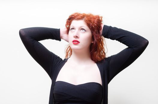 beautiful red hair and lips girl on white background