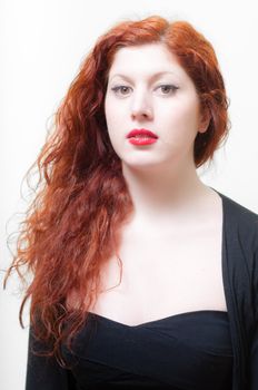 beautiful red hair and lips girl on white background