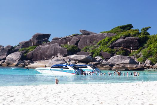 SIMILAN, THAILAND - MARCH 01: Tourists get into the boat, Similan islands, Thailand, 01.03.2012. On islands the untouched nature remained. Since 1982 the archipelago is declared by national park