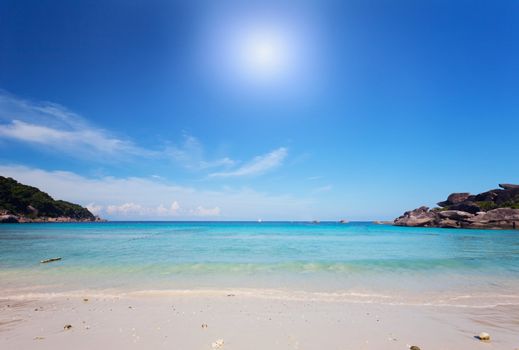 Scenic sand beach under bright blue sky, Similian Islands, Thailand