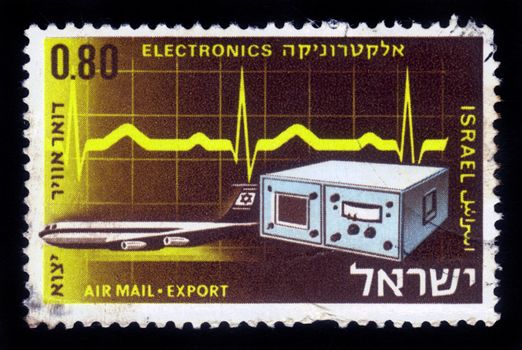ISRAEL - CIRCA 1968: A stamp printed in Israel, shows electronic measuring device on background signal of oscilloscope and transport aircraft of El Al , series Israel products exported by air, circa 1968