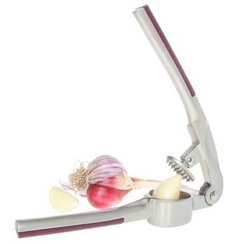 Garlic press on a white background.