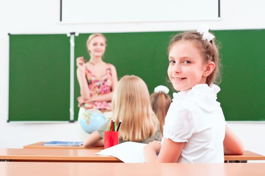 portrait of the girl in the class, the teacher tells the next school board