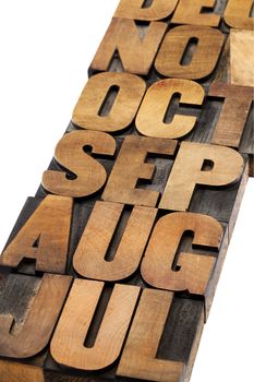 calendar abstract - 3 letter month symbol - isolated text in vintage letterpress wood type printing blocks