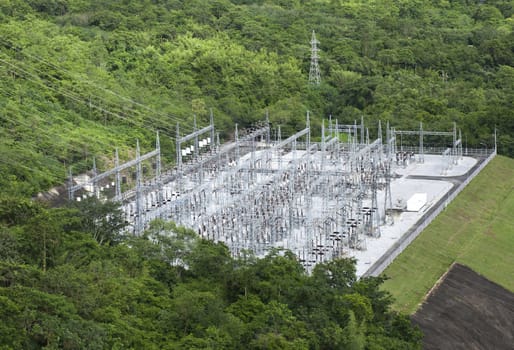 High Voltage Substation against the forest