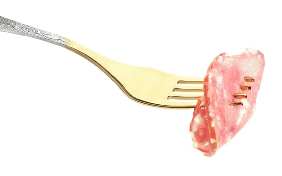 Sausage on a fork on a white background.