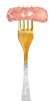 Sausage on a fork on a white background.