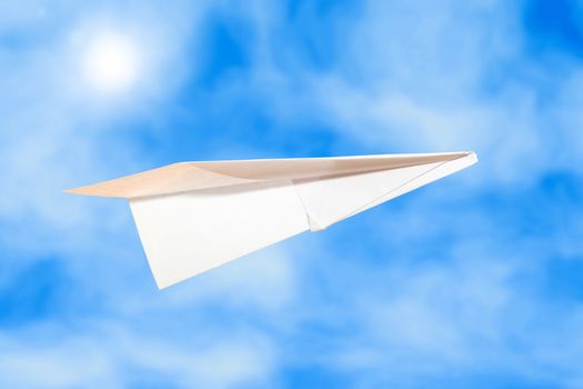 paper plane on a blue sky backgrounds