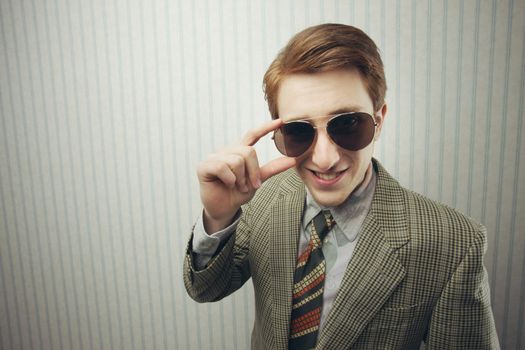 Sleazy Retro Businessman, on vintage wallpaper background