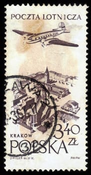 POLAND - CIRCA 1957: a stamp printed in Poland shows plane flying over Krakow, circa 1957