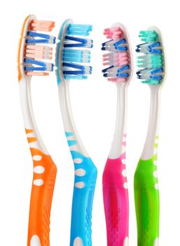 Composition with toothbrushes isolated on white background