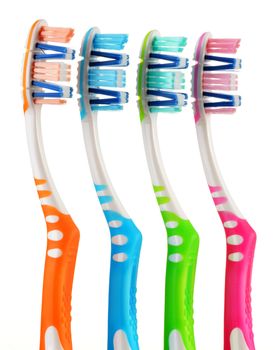 Composition with toothbrushes isolated on white background