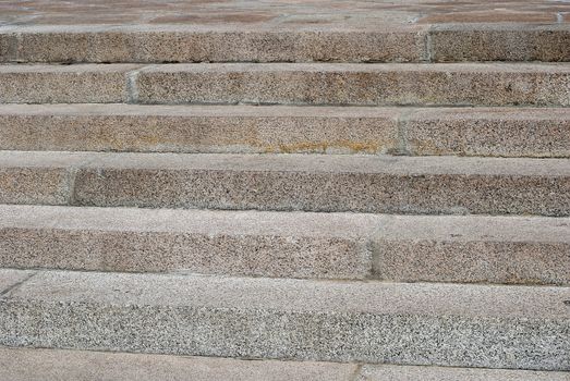 Granite stone stairs closeup in sunny day as background