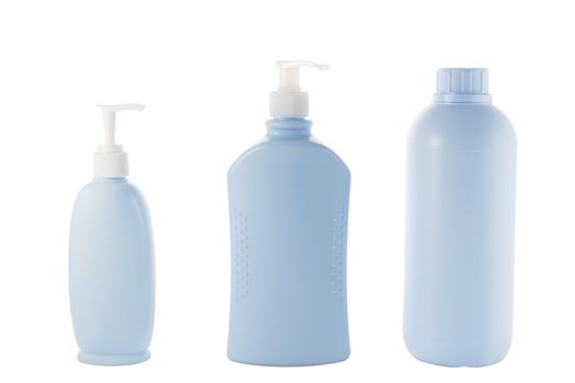 three Hair and Skin care bottles on a white background