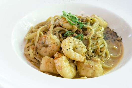 Linguini with Pan Seared Tiger Prawns and Scallops in a Bisque Cream Sauce Closeup