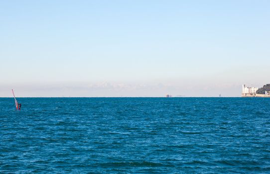 View of a Windsurfer in the Trieste sea